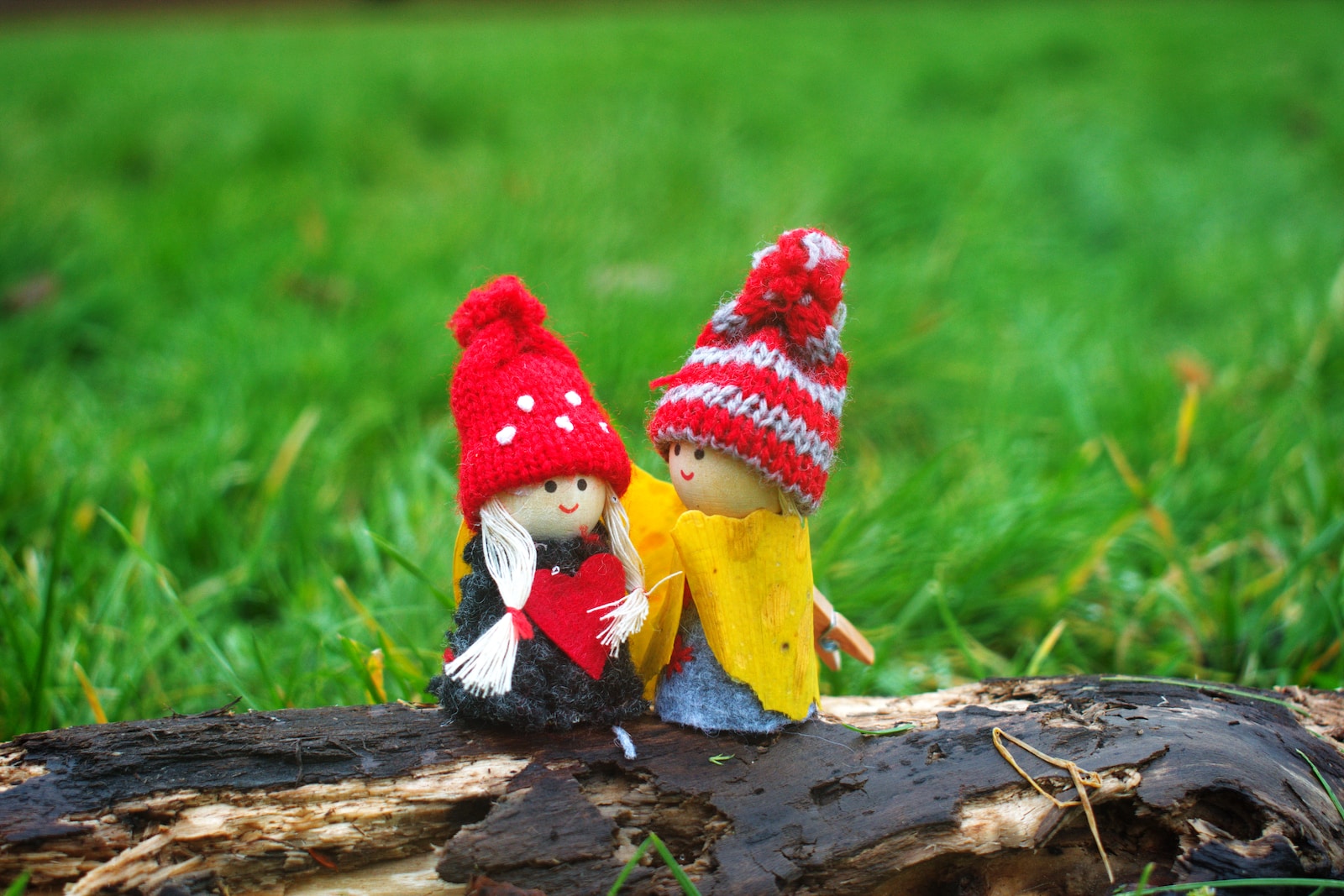 two doll wearing knit caps